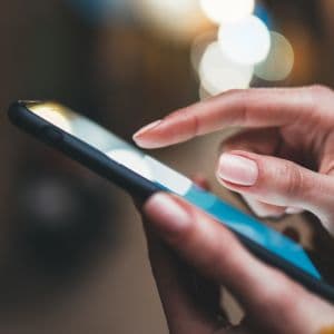 A person interacting with a phone